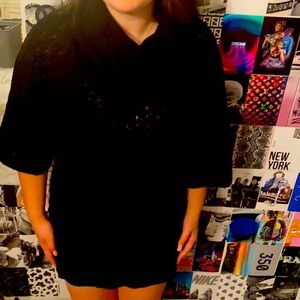 This is a Cowell neck three-quarter sleeve black Old Navy medium sweater